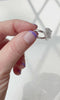 Video showing a platinum pear cut diamond wedding ring